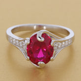 Oval Red Ruby Sterling Silver Ring with Moissanite Accent